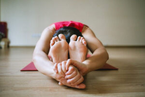 vrouw in yoga houding
